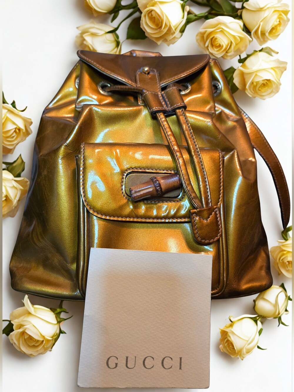 Gucci Gold Enamel Leather Drawstring Backpack